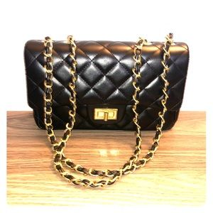 Black quilted flap bag